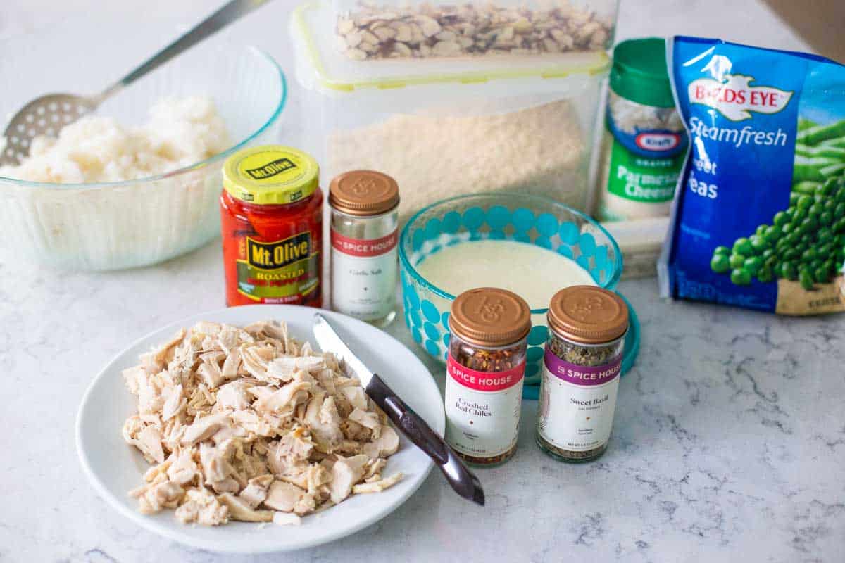 The Ingredients for Chicken Alfredo Rice are on the kitchen counter.