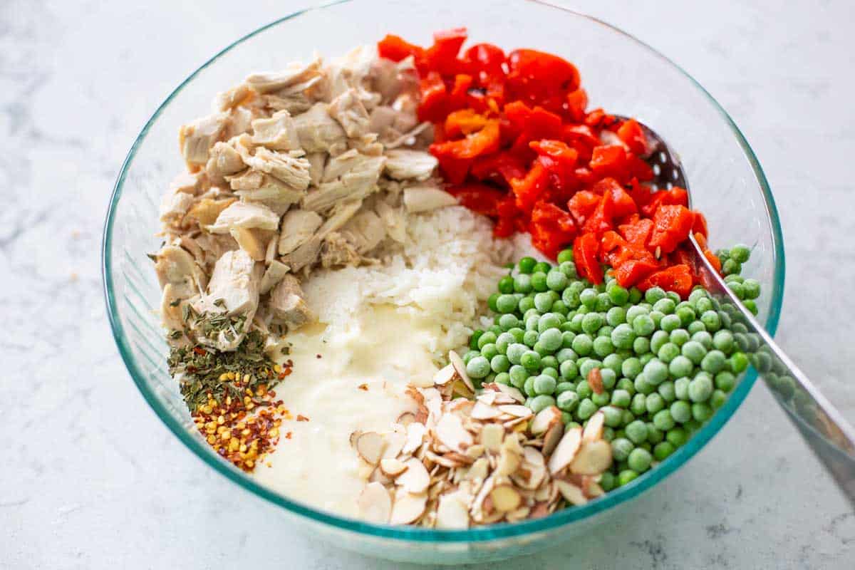 All the ingredients for the casserole have been prepped and placed in a large mixing bowl. 