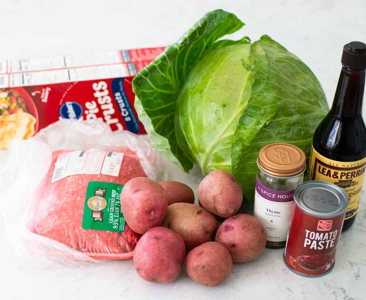 The ingredients to make homemade beef hand pies are on the counter.