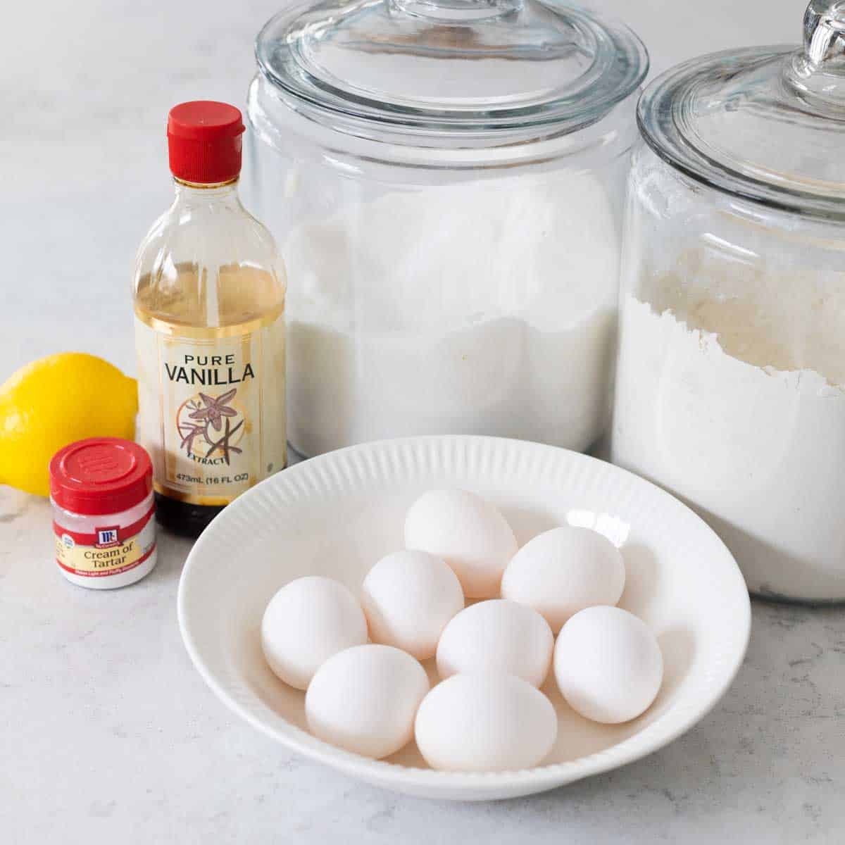 The ingredients to make the almond crunch cake are on the counter.