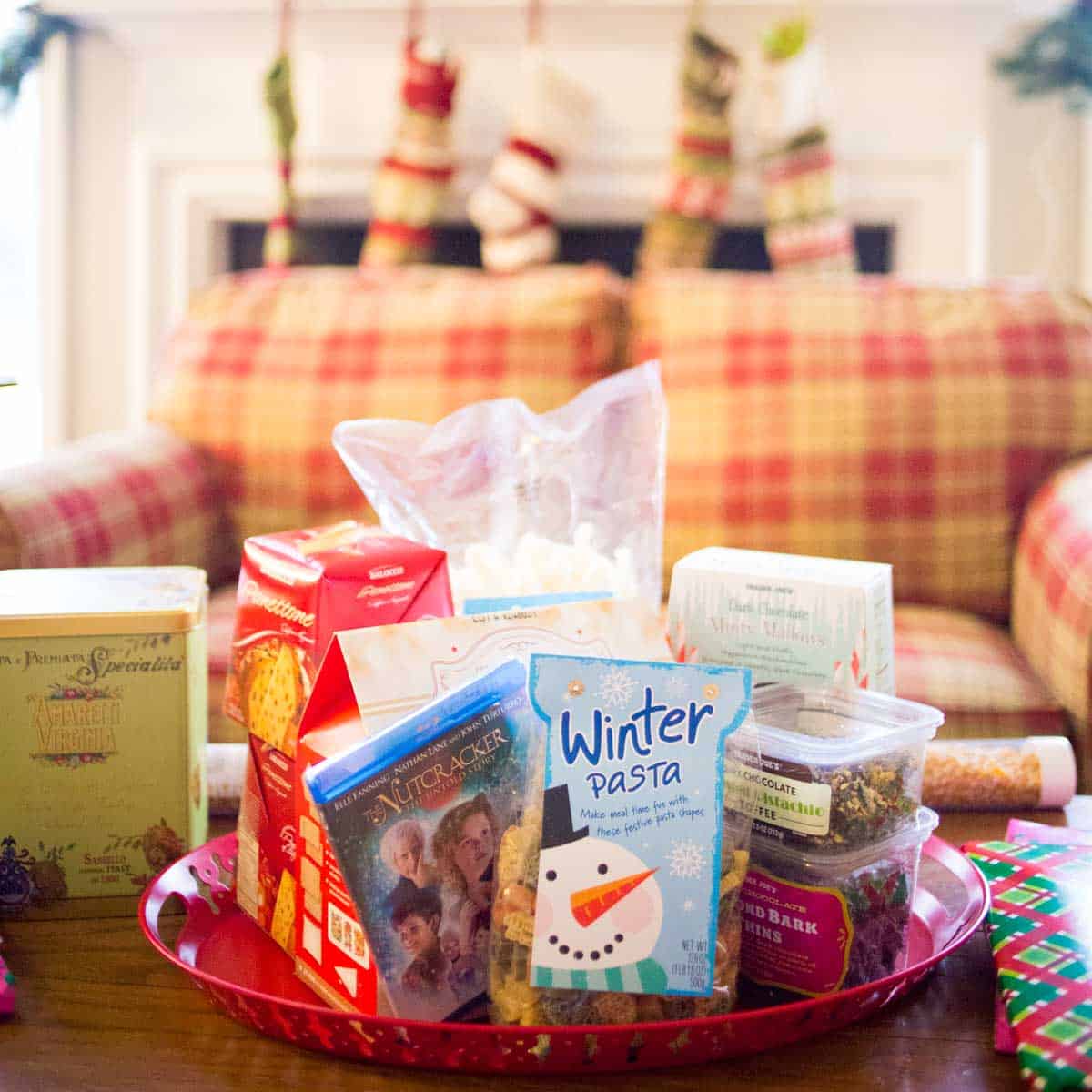 A red tray filled with Christmas foods for the whole family to enjoy.