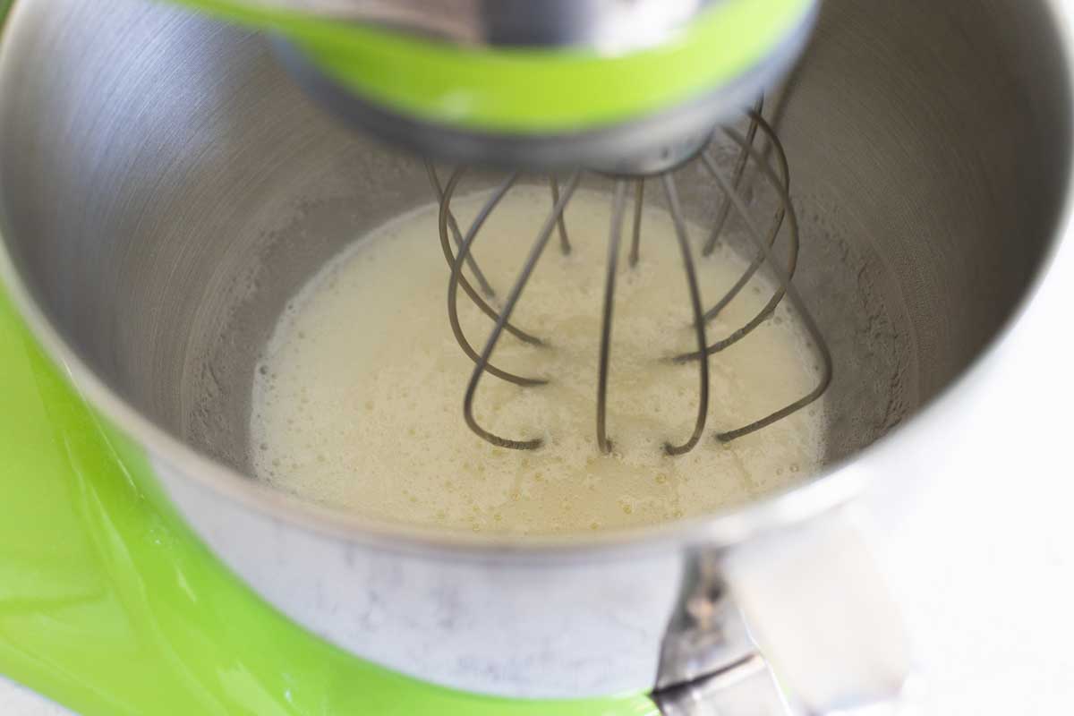 The egg whites are now being whisked in a mixer.