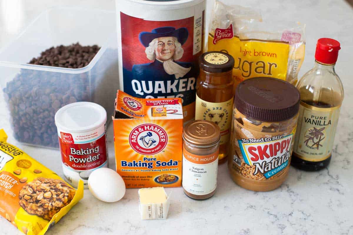 The ingredients to make homemade granola bars are on the counter.