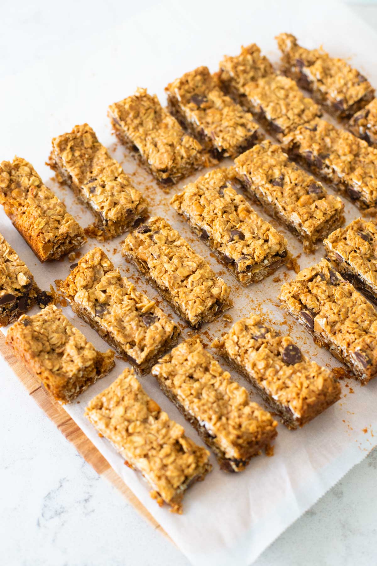 The bars have been cooled completely and cut into granola bar shape with a chef knife.