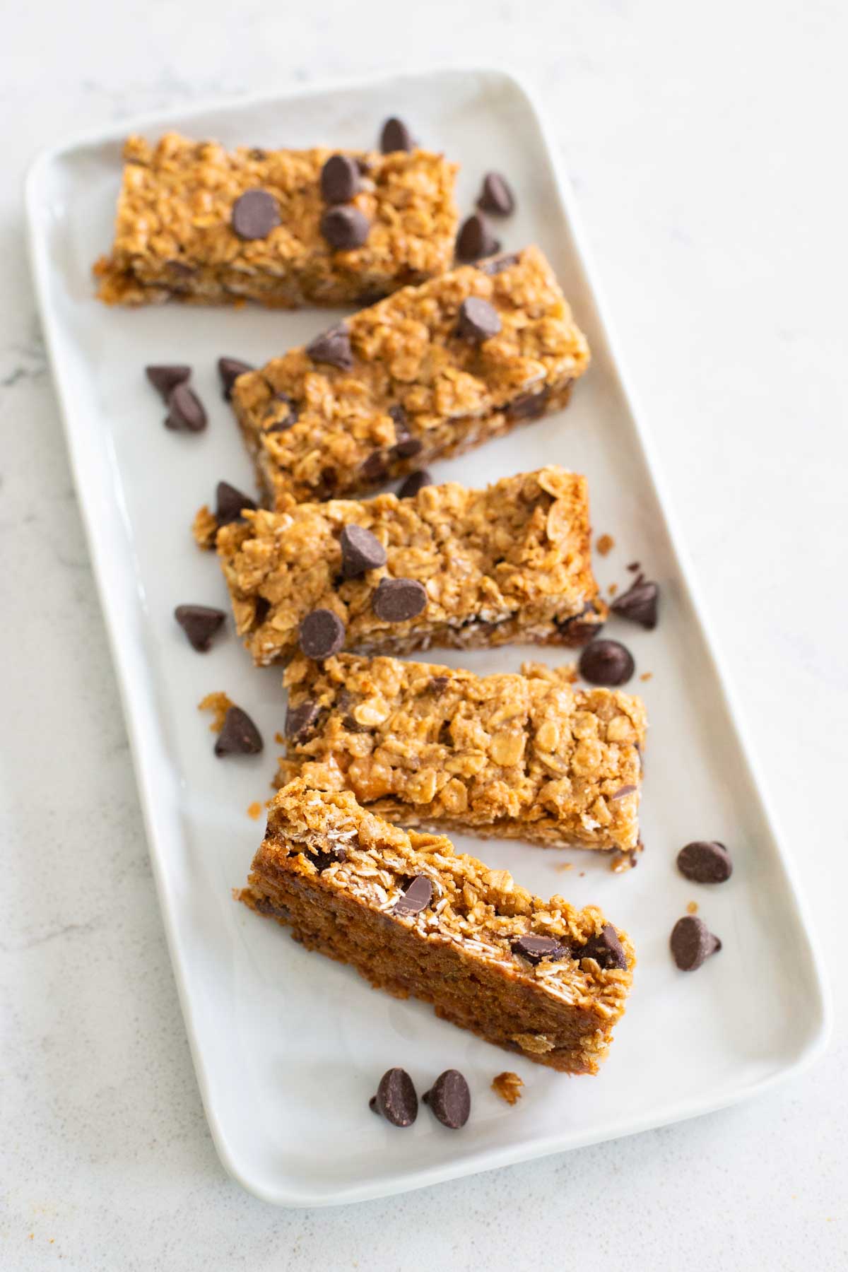 A platter of granola bars are ready to be served.