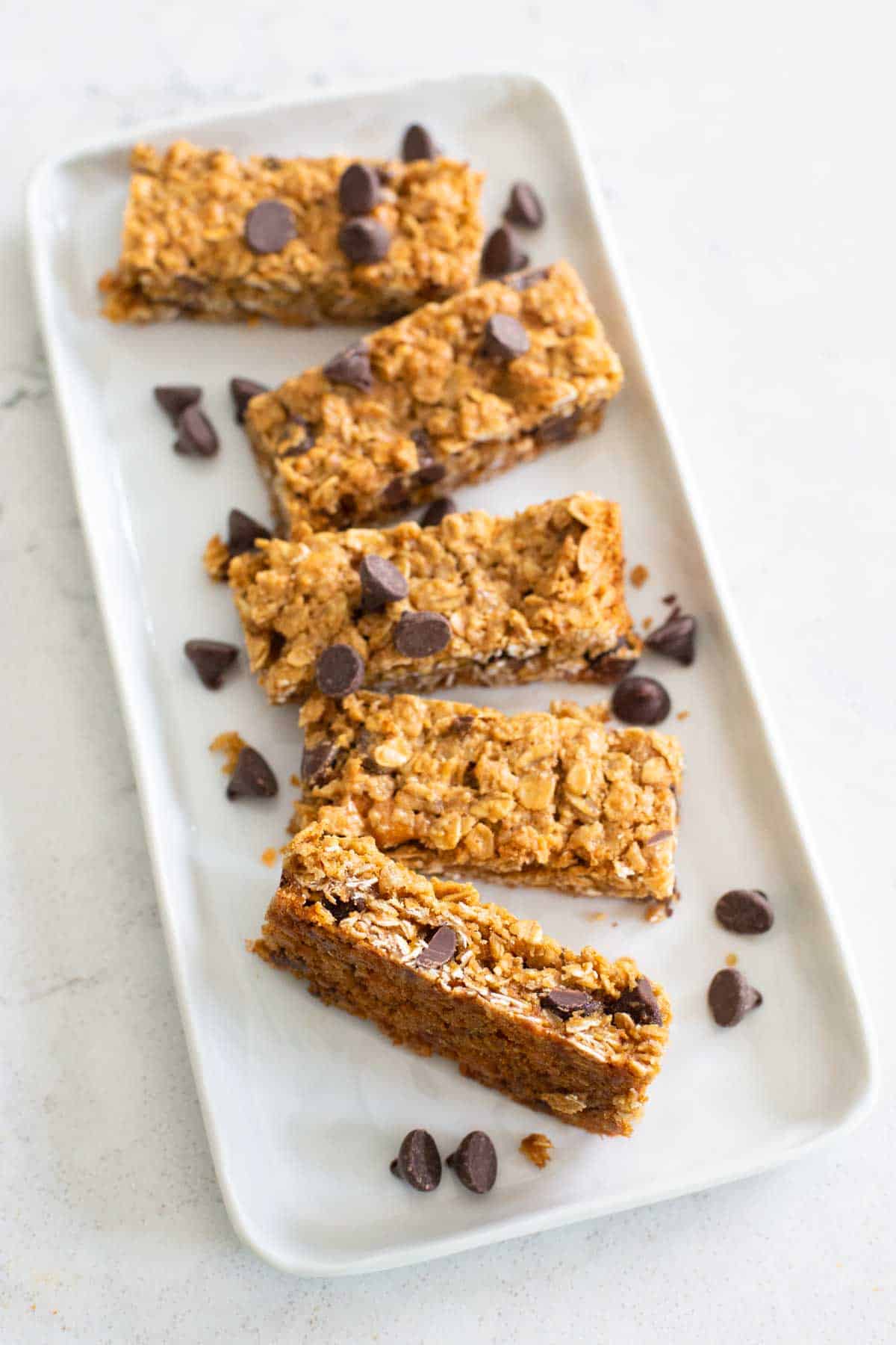 A platter of granola bars are ready to be served.