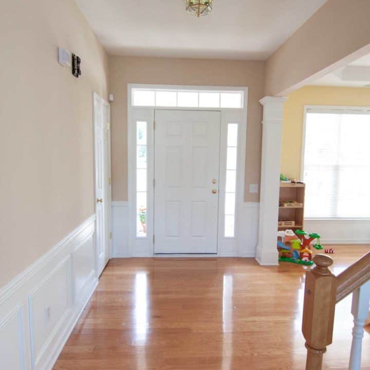 The "before" picture of a dining room entryway area.