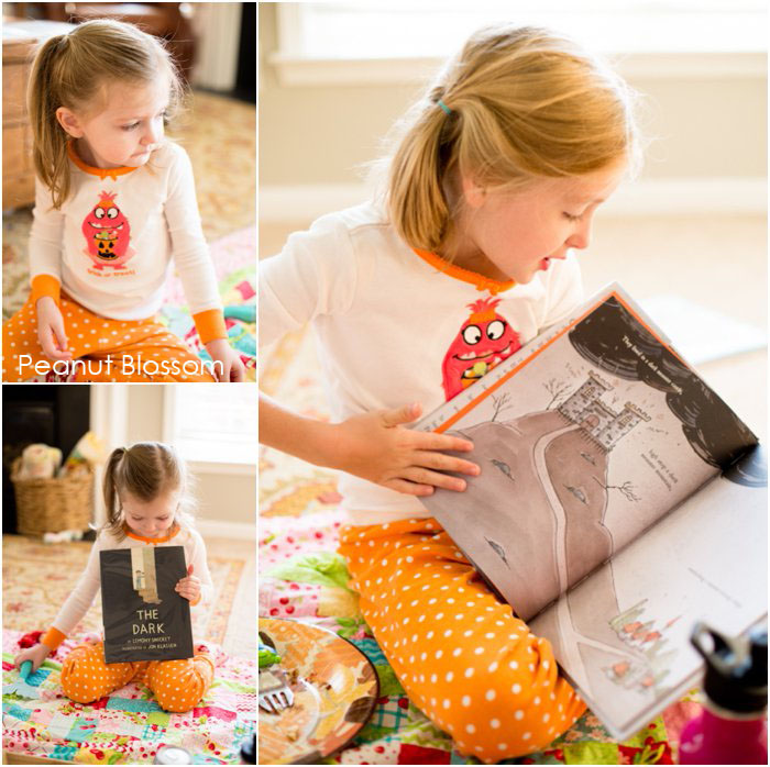 Another photo collage that shows the girls reading a Halloween story on the floor.
