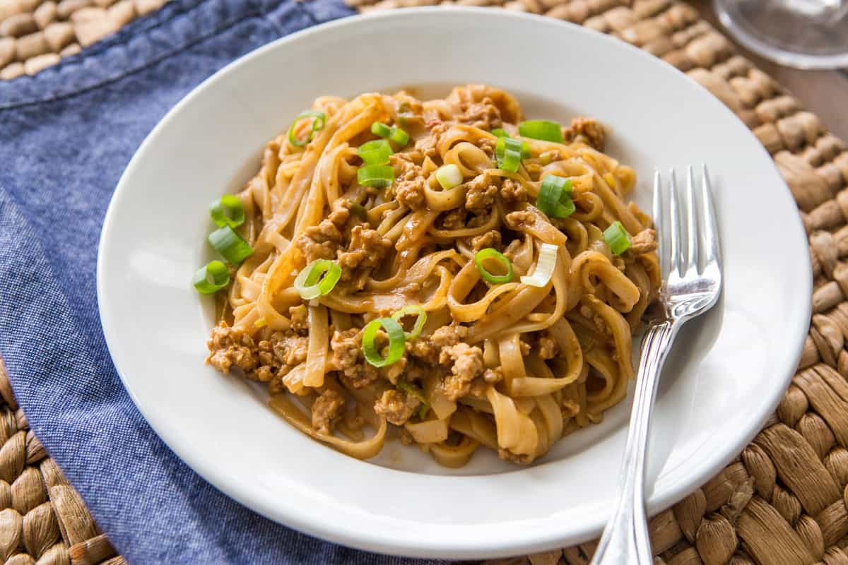 Chinese noodles with pork and spicy peanut sauce