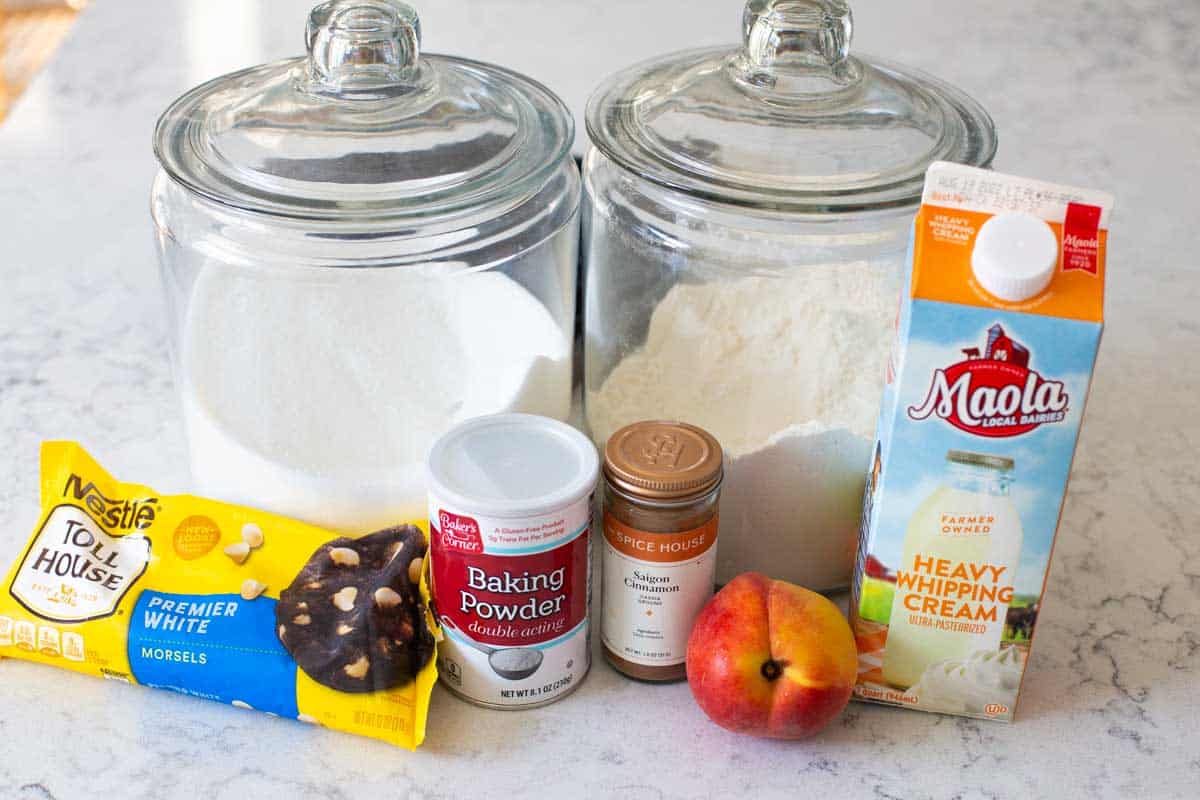 The easy ingredients to make fresh peach scones are on the counter.