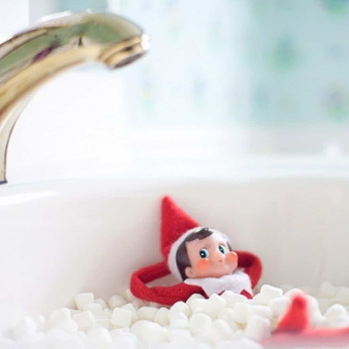 The Elf on the Shelf is soaking in a sink full of mini marshmallows.