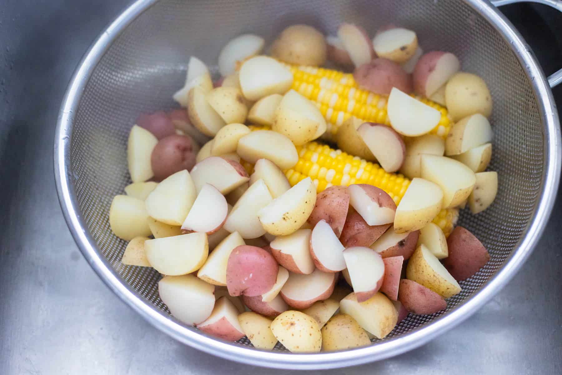 The potatoes and corn have been drained.
