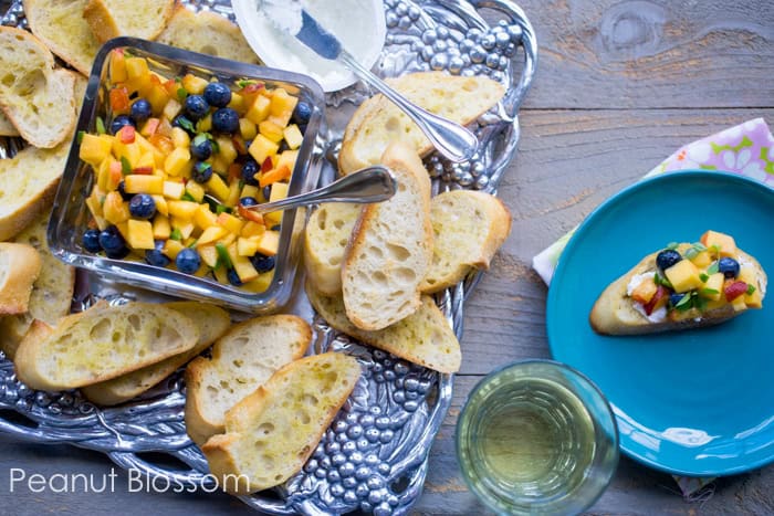 Elegant peach blueberry salsa with goat cheese crostini