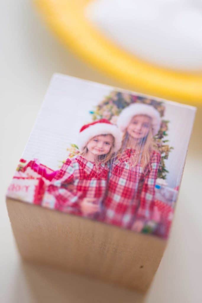 A close-up of the photo glued to the wooden block to show texture.