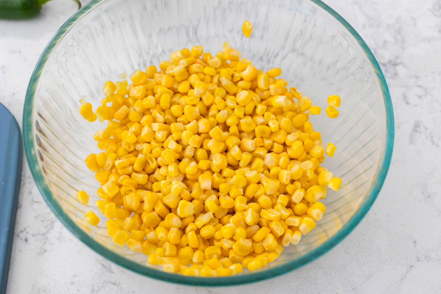 A bowl of thawed frozen corn.