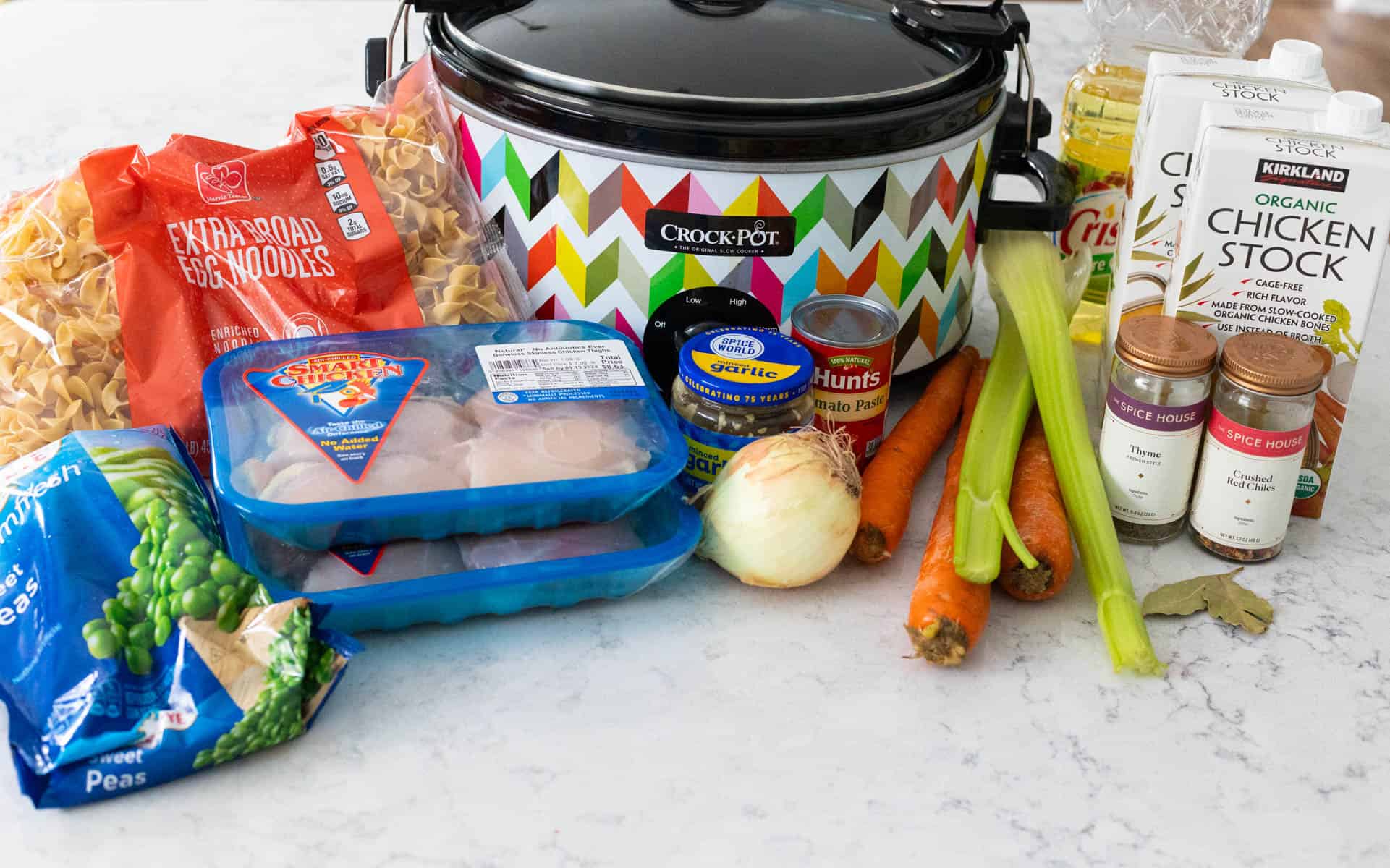 The ingredients to make the homemade chicken soup are on the counter.