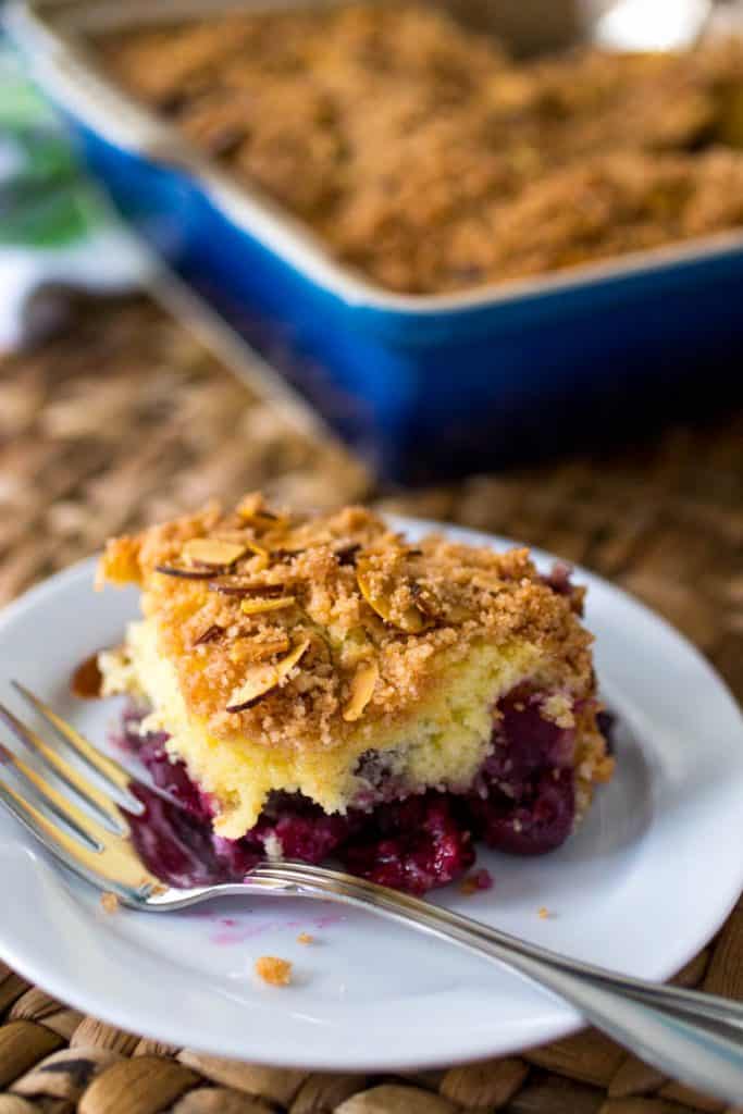 This cherry almond cinnamon streusel coffee cake has a buttery topping that is To Die For! Such an easy way to use up fresh cherries from the farmer's market.