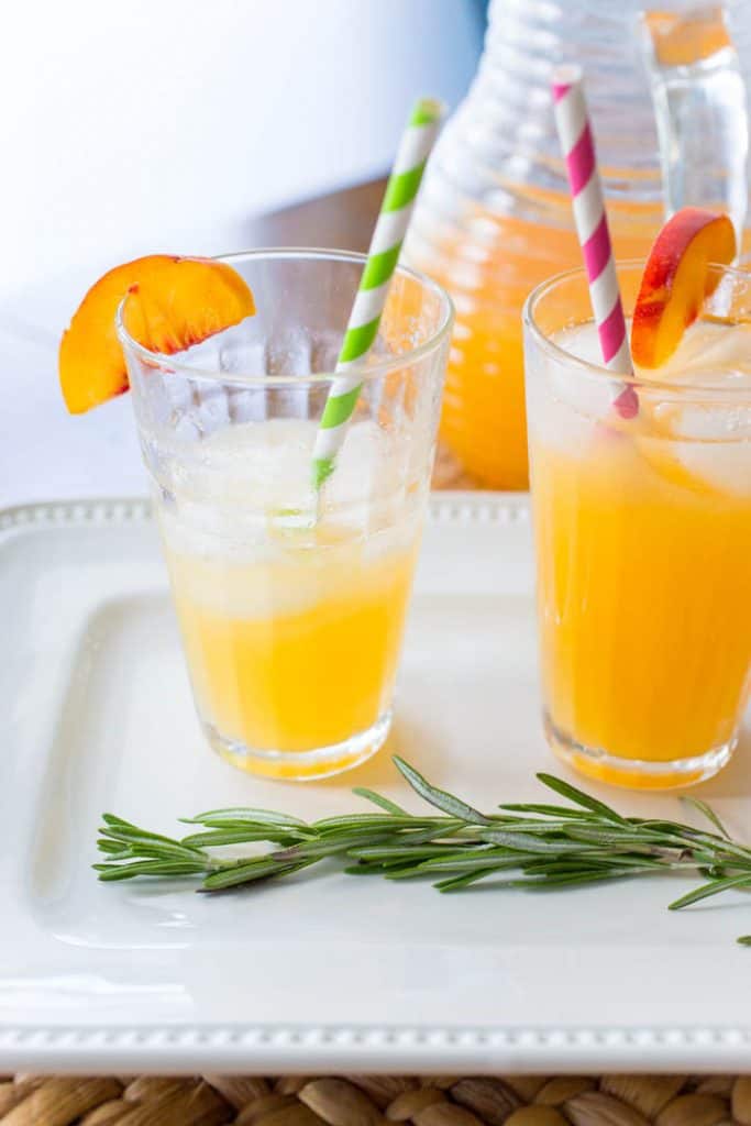 How to garnish a rosemary infused peach lemonade recipe for summer entertaining