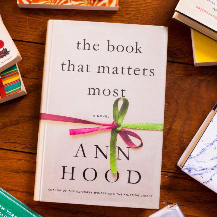 A copy of The Book That Matters Most by Ann Hood sits on a table.