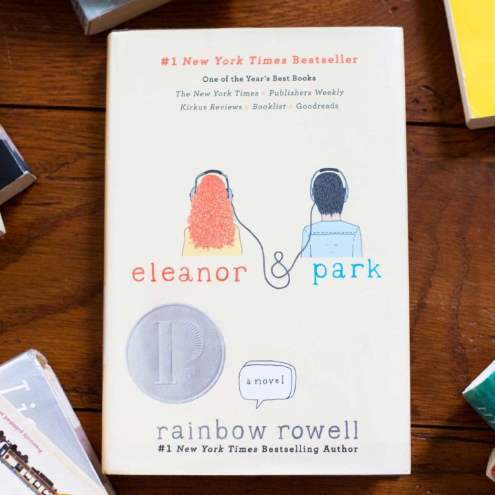 A copy of Eleanor and Park by Rainbow Rowell sits on a table.