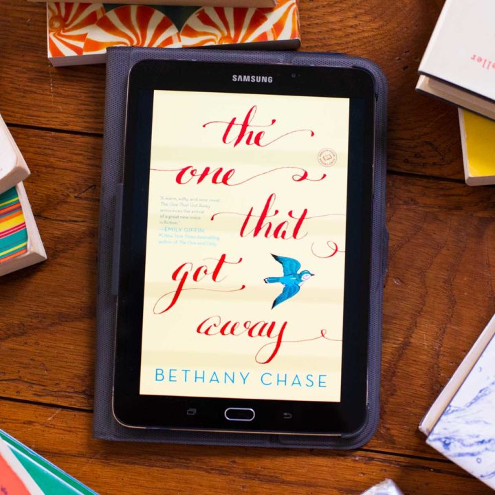 A copy of The One That Got Away appears on a digital reader tablet screen on a table.