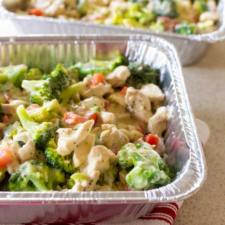 A metal pan of chicken and broccoli rice casserole is ready for the freezer.