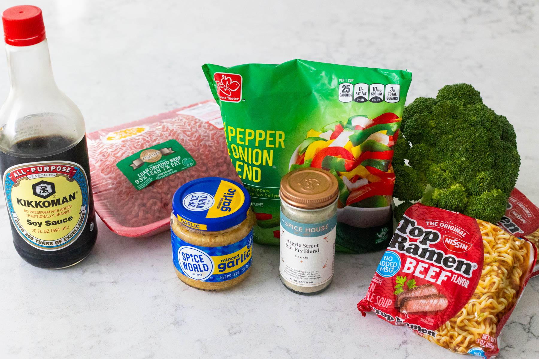 The ingredients to make the ground beef stir fry are on the counter.