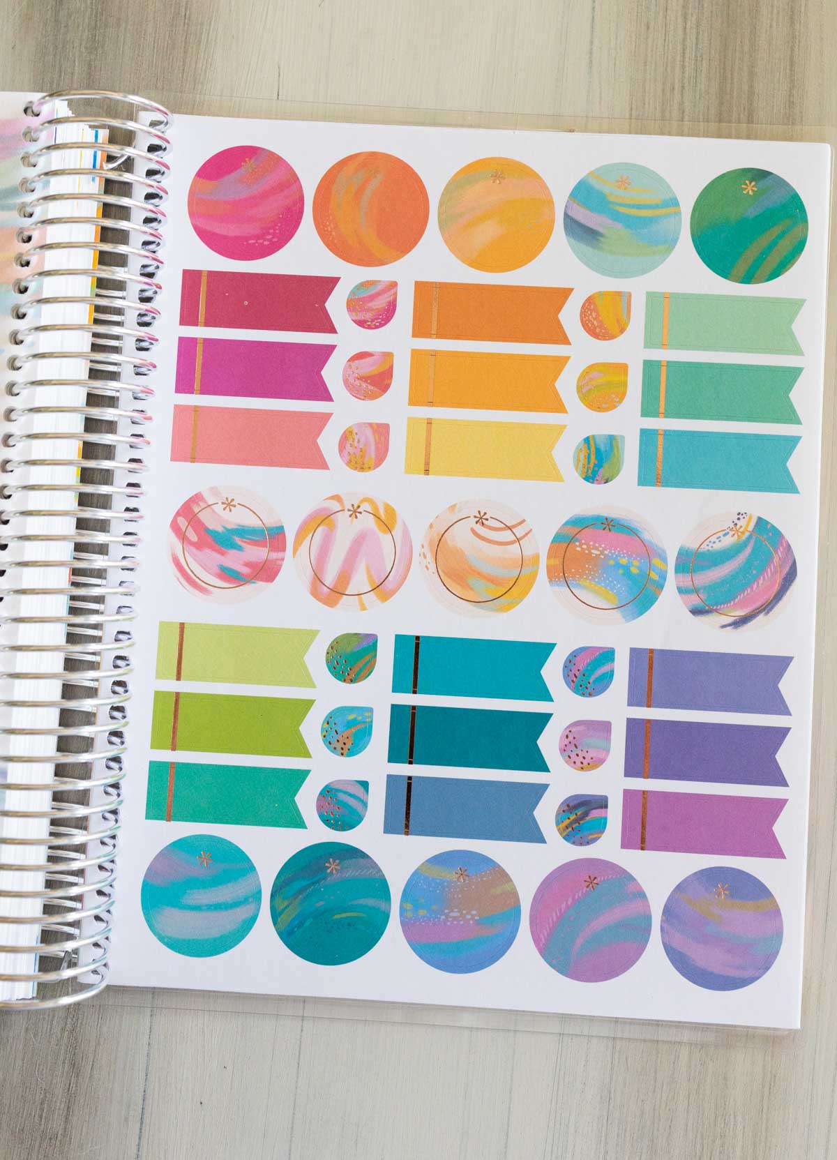 The colorful stickers included in the back of each planner.