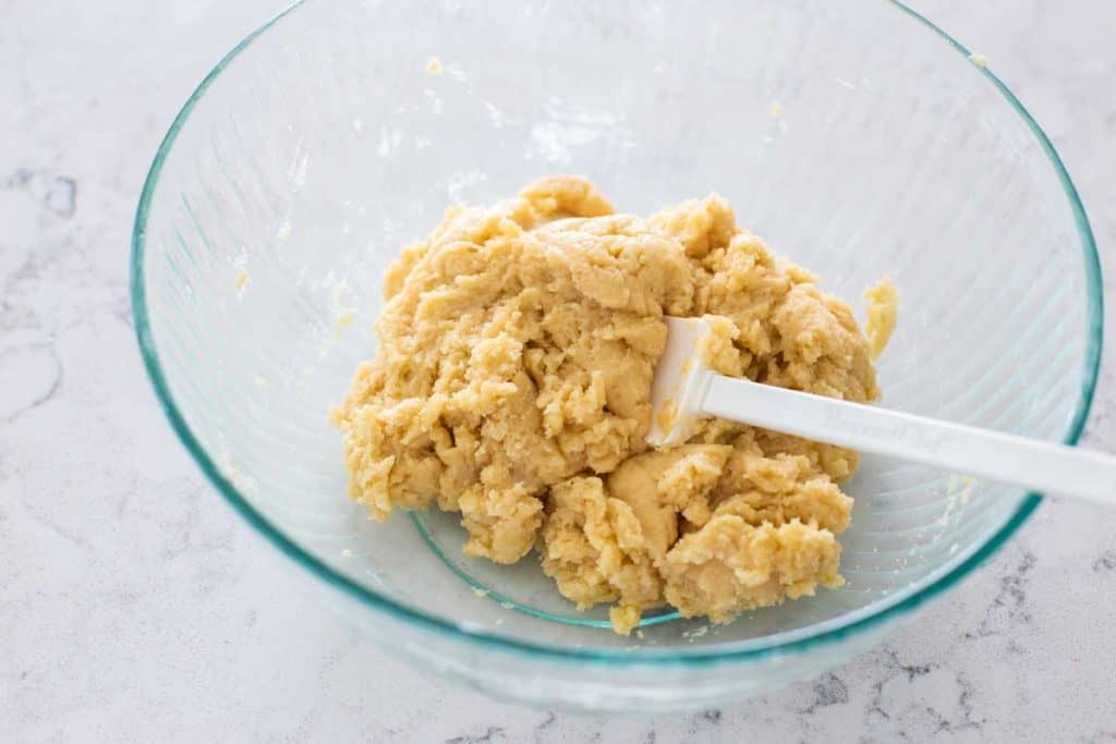 The prepared cobbler dough is in a mixing bowl.