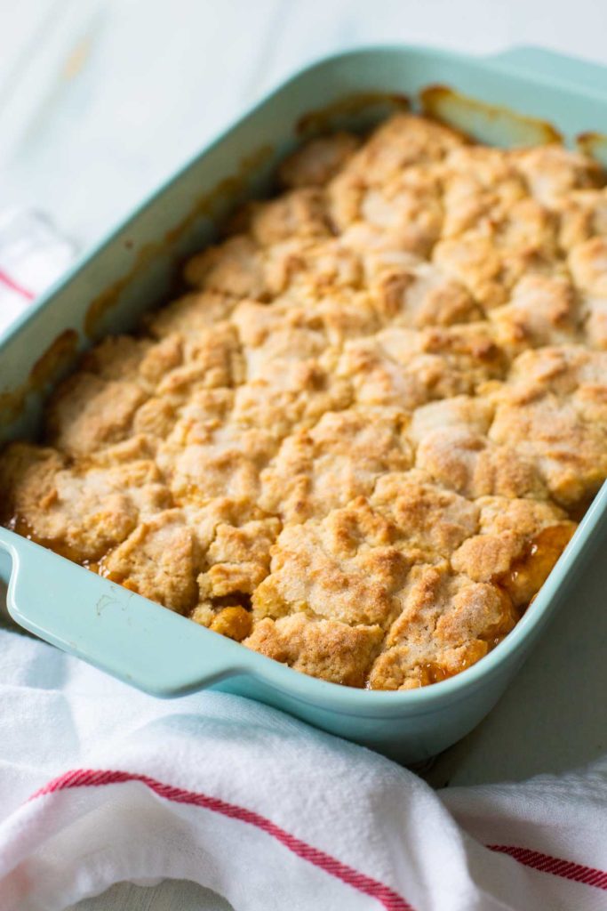 The finished peach cobbler shows how the crust should look after baking.