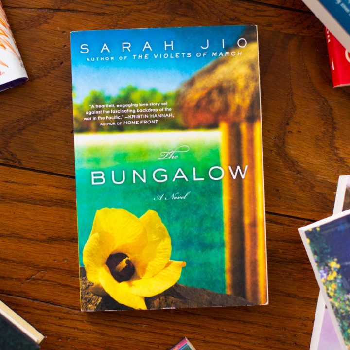 A copy of The Bungalow sits on a table.