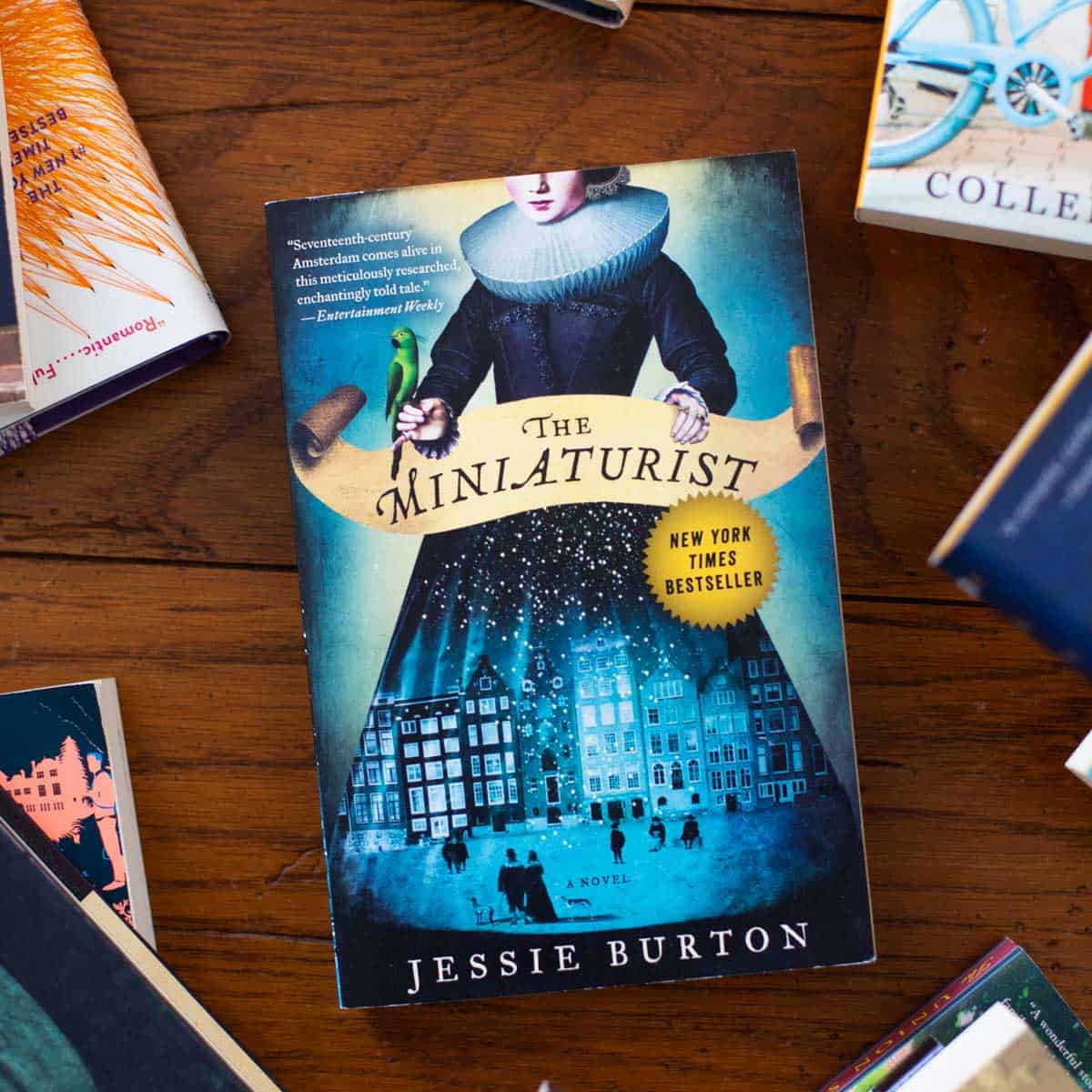 A copy of The Miniaturist sits on a table.