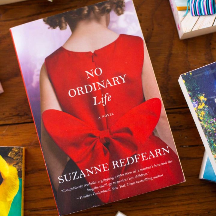 A copy of No Ordinary Life sits on a table.