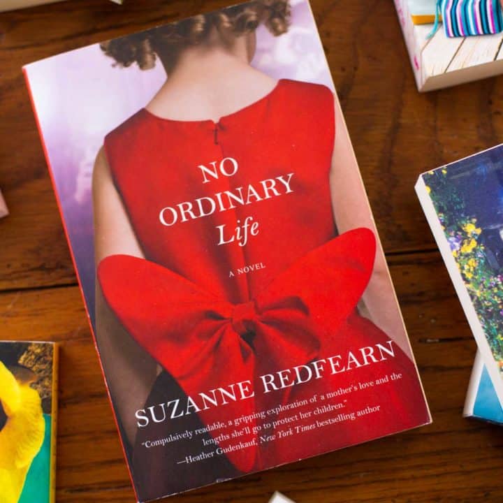 A copy of No Ordinary Life sits on a table.
