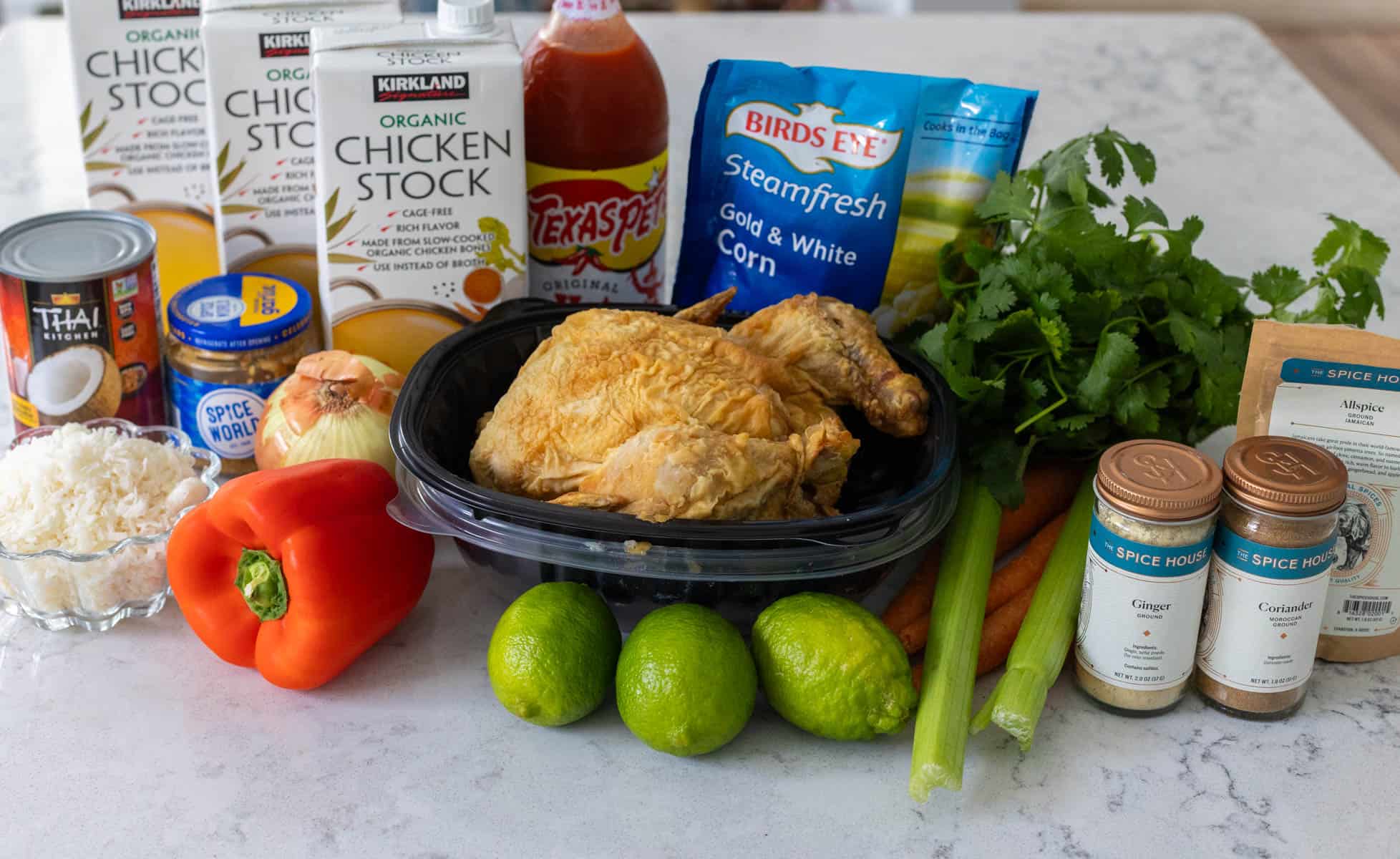 The ingredients to make Caribbean chicken soup are on the counter.