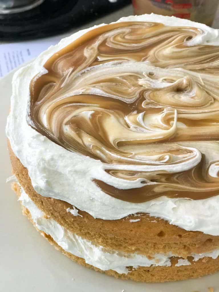 Swirl the butterscotch sauce into the marshmallow topping for an easy Harry Potter cake.