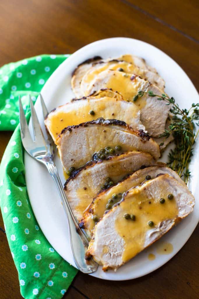 Make-ahead oven roasted pork loin with an easy green peppercorn sauce recipe