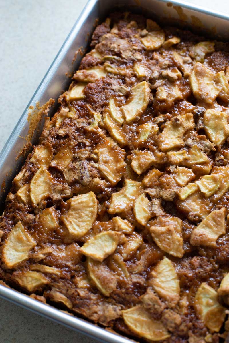 The apple cake is out of the oven and you can see how many apples are in the cake.
