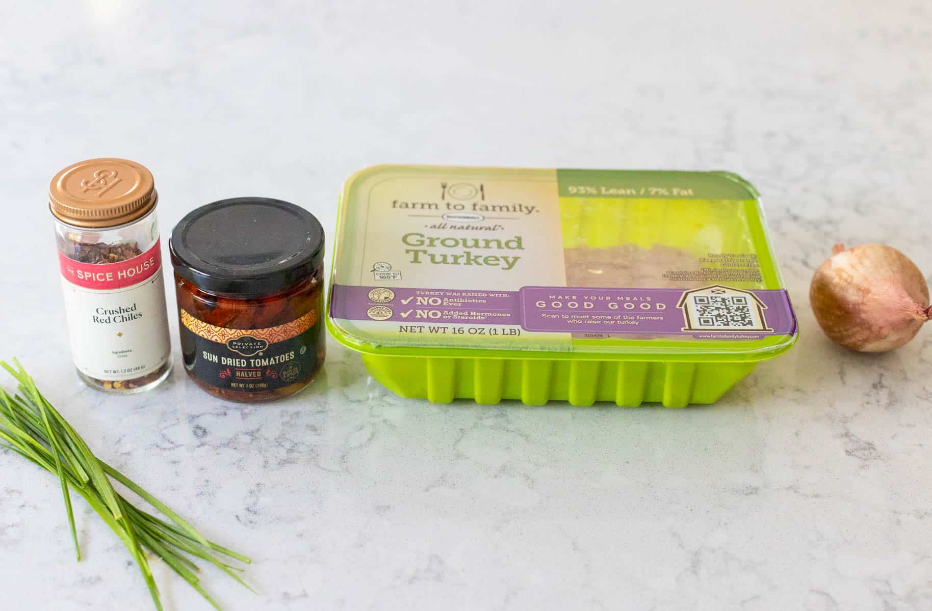 The ingredients to make the turkey burgers are on the counter.