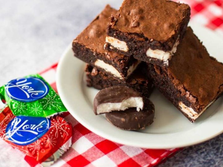 A platter of peppermint brownies has York candies next to it.