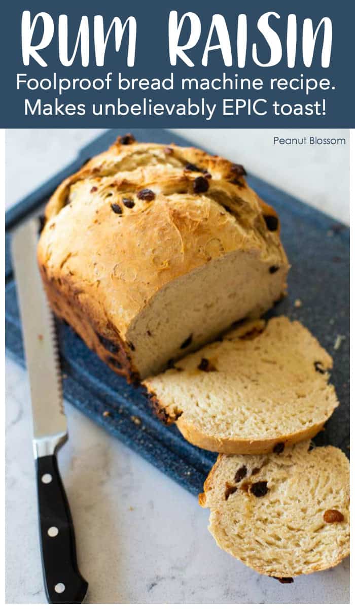 A loaf of bread machine raisin bread has been sliced on a cutting board.