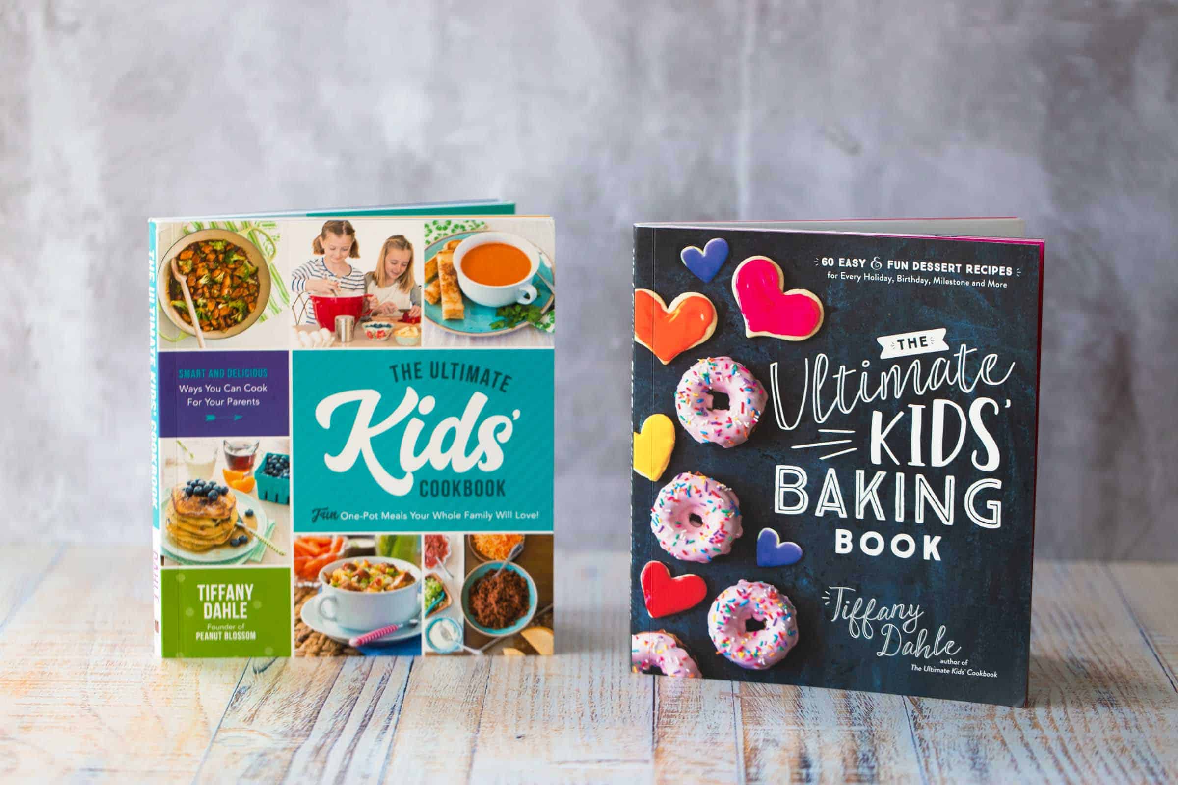 The covers of both The Ultimate Kids' Cookbook by Tiffany Dahle and The Ultimate Kids' Baking Book by Tiffany Dahle 
