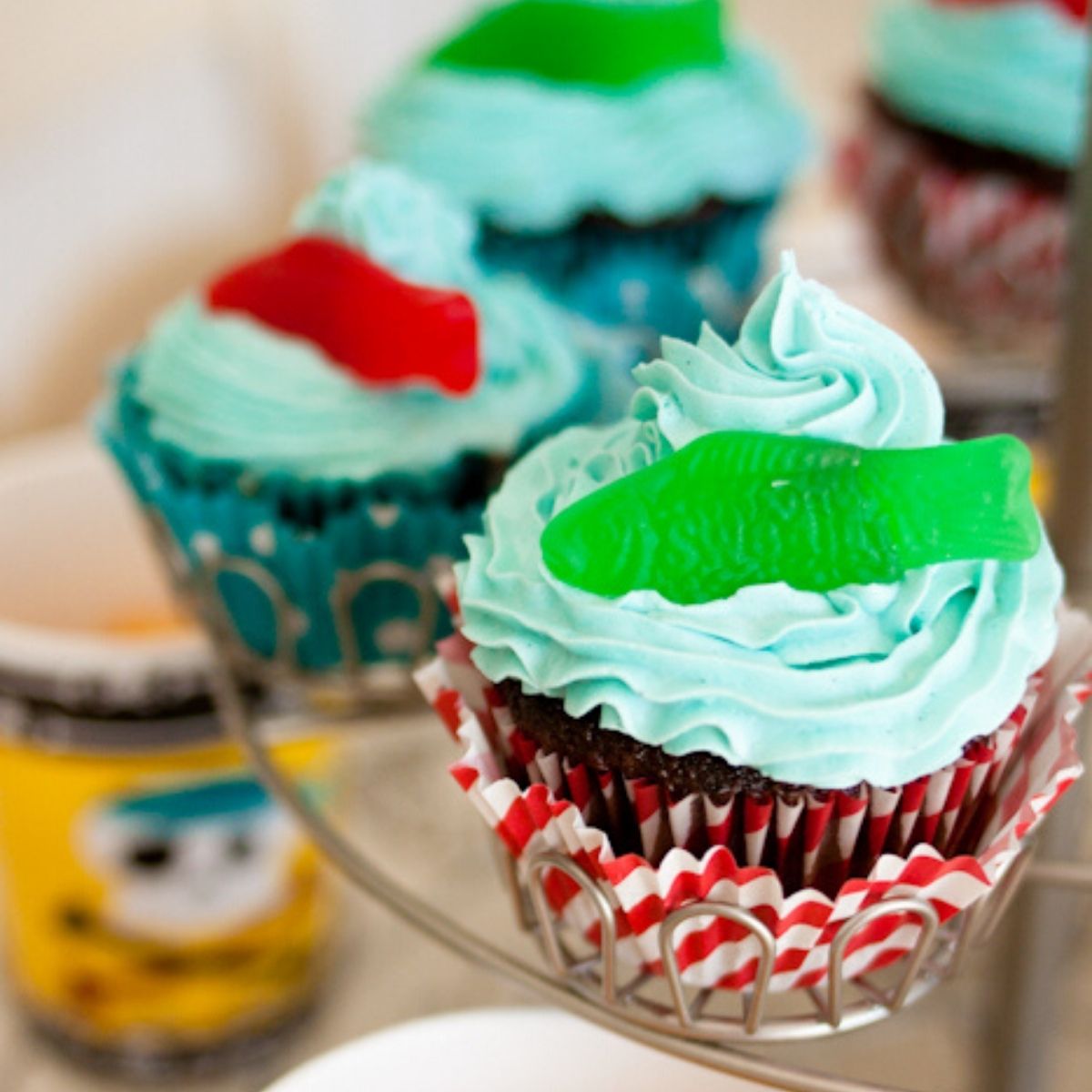 Pirate party cupcakes featuring blue frosting with Swedish fish.