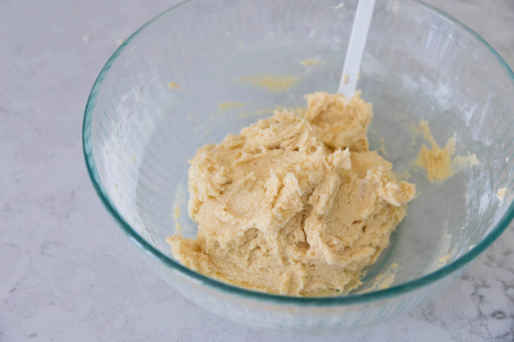 The mixing bowl has the final cookie dough.