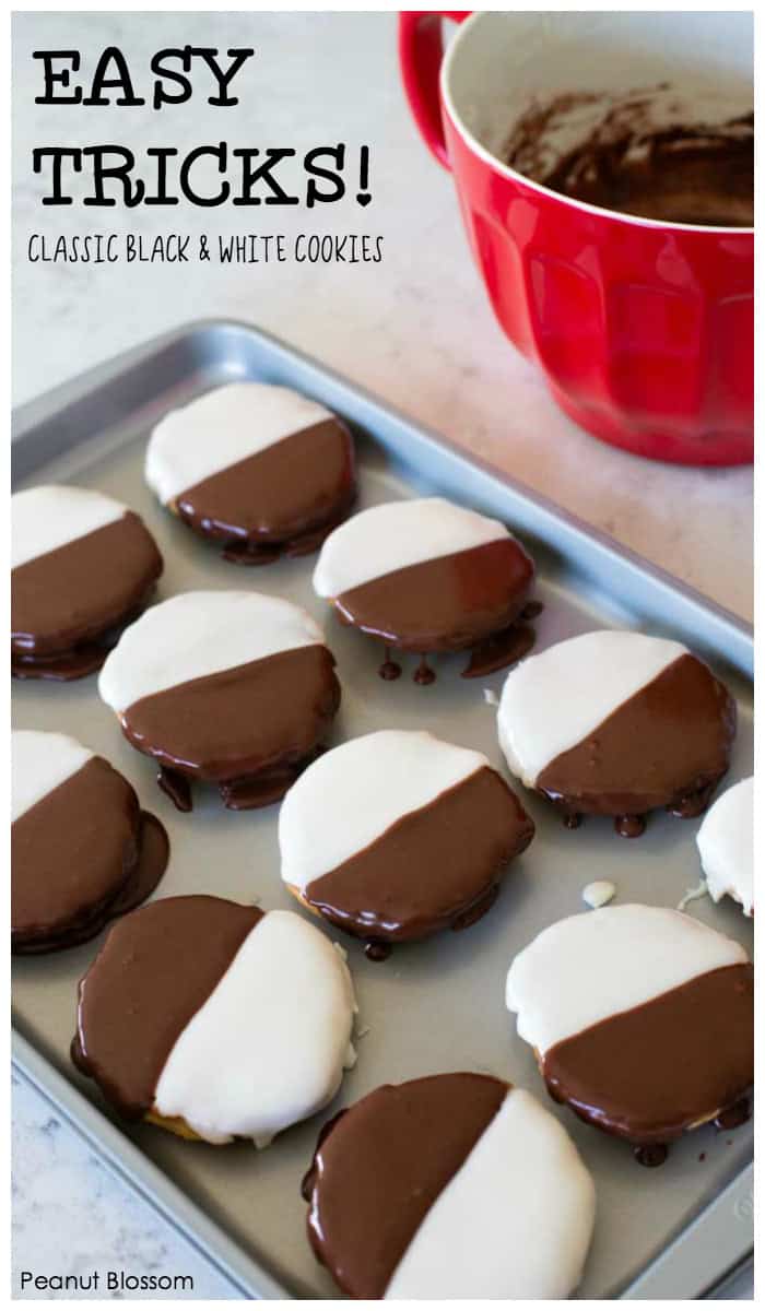 Black and white cookies on a baking sheet.