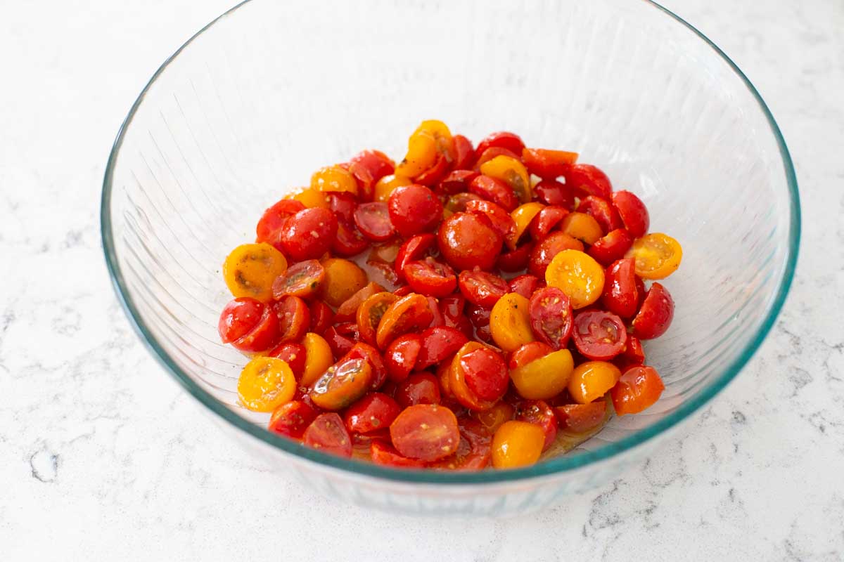 Marinated Tomatoes in a Large Mixing Bowl