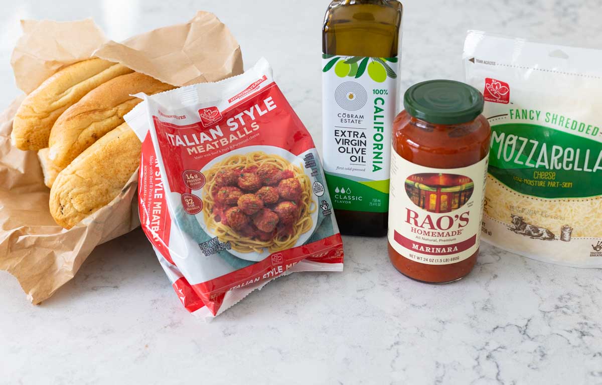 The ingredients to make the meatball subs are on the counter.