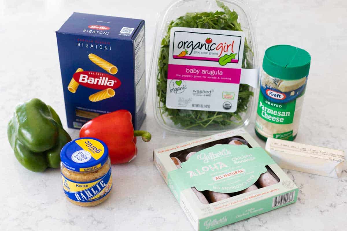 The ingredients to make sausage and peppers pasta with no tomato sauce are on the counter.