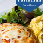 The photo shows the chicken parm on a dinner plate.