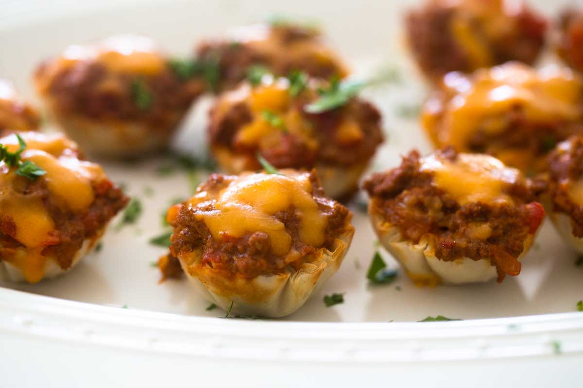 A close up shot of the taco filling inside the phyllo dough cups.